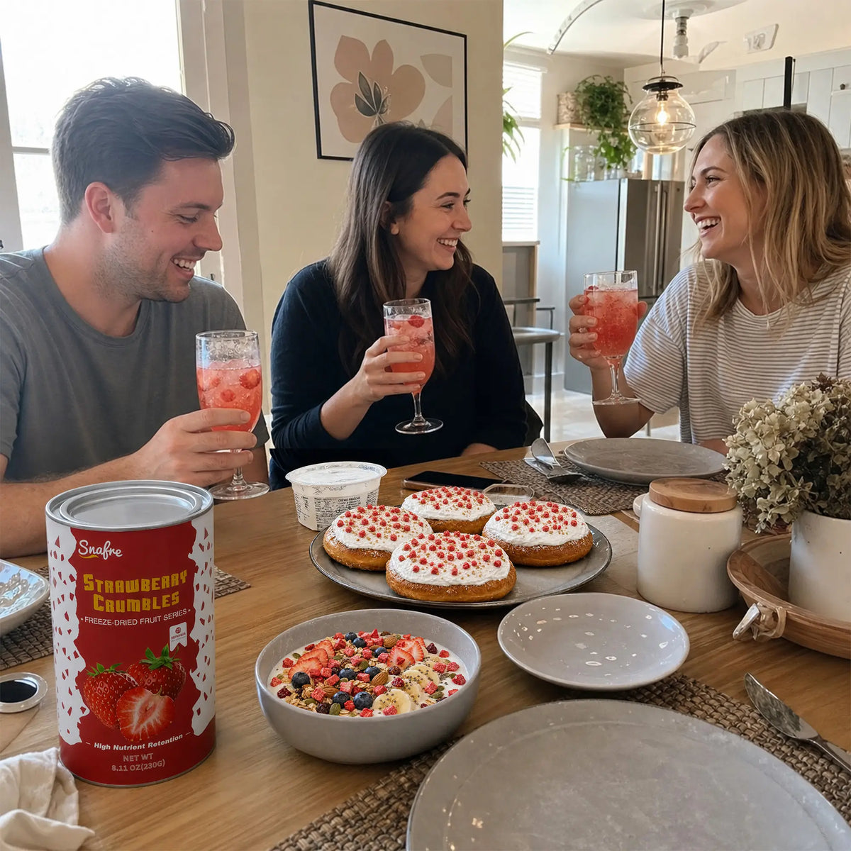 Friends_sharing_healthy_breakfast_and_drinks_with_SNAFRE_strawberry_crumbles