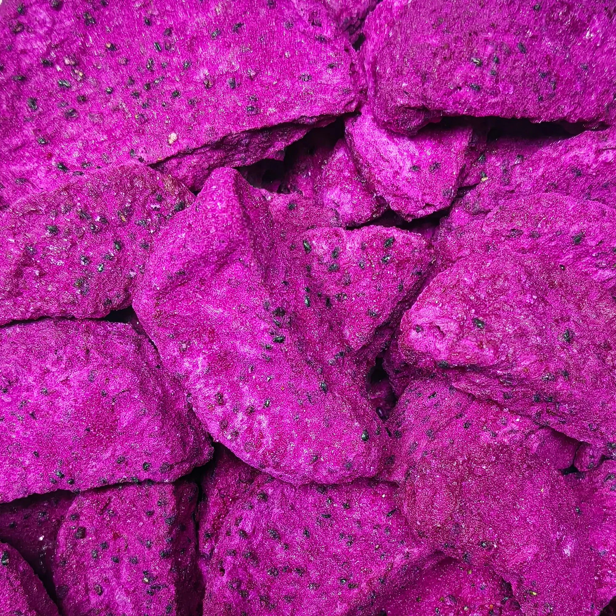 Close-up texture of 100% natural freeze-dried red dragon fruit slices