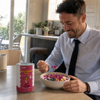 ManeatinghealthybreakfastyogurtbowltoppedwithSNAFREdragonfruit