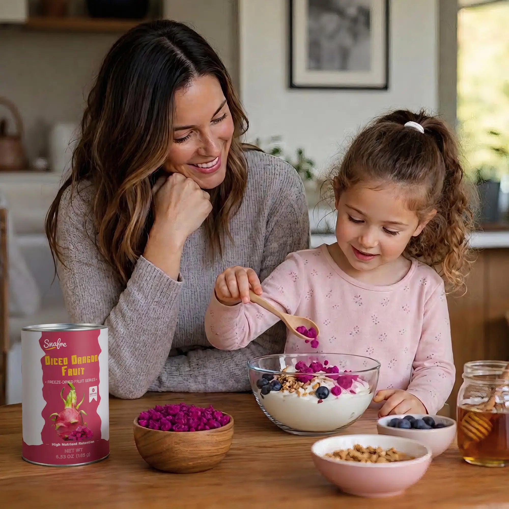 Mother_and_child_enjoying_healthy_breakfast_with_SNAFRE_dragon_fruit_topping