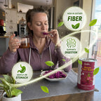 Woman eating crispy red dragon fruit slice supporting gentle digestion and gut health