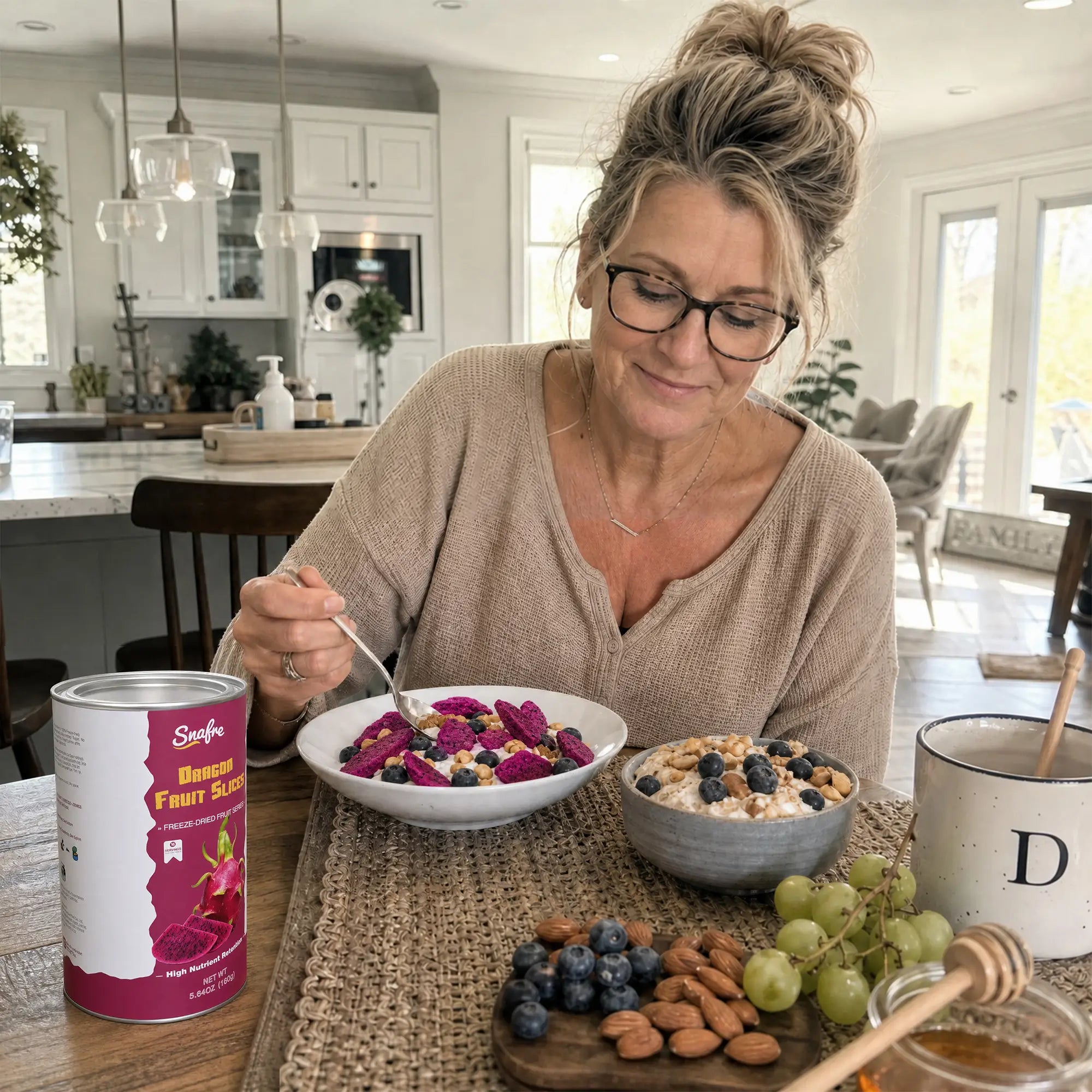 Woman enjoying a healthy smoothie bowl topped with SNAFRE red dragon fruit slices